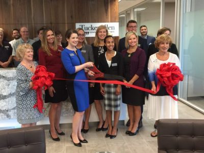 Mary Elizabeth Coleman, Lori Hootman, Stephanie Martinez, Mike Warner, Jami Condon and Ava Rollins cut the ribbon at TuckerAllen's Kirkwood location.